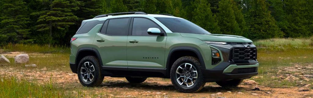 Green Chevy SUV outdoors.